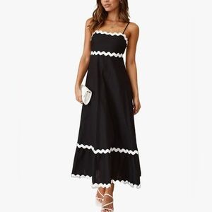 Adjustable spaghetti strap midi dress. Machine wash.95% Polyester & 5% Elastane.